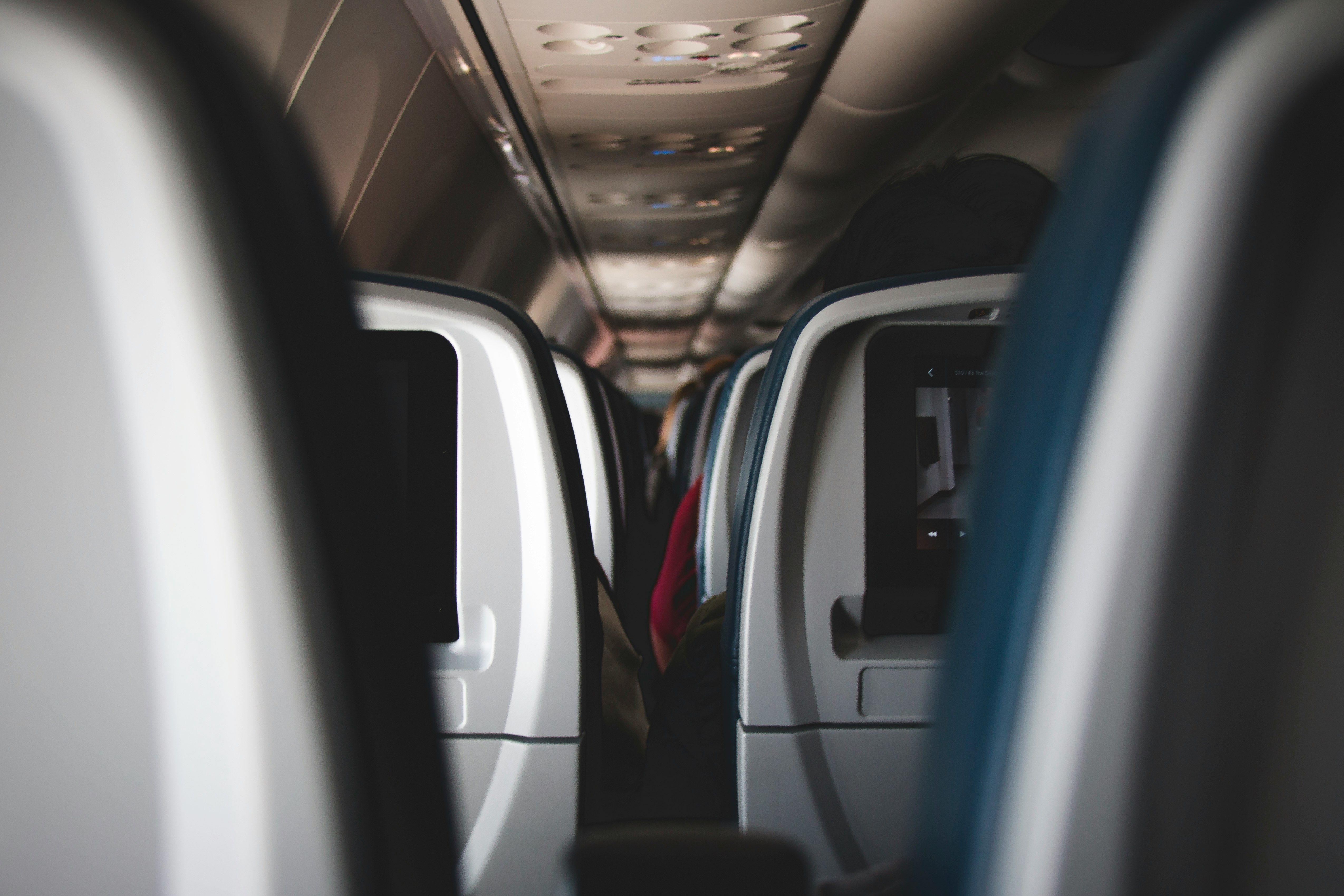 close-up photography of airplane chairs